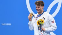 Gold medallist USA's Robert Finke poses with their medal after the final of the men's 800m freestyle swimming event during the Tokyo 2020 Olympic Games at the Tokyo Aquatics Centre in Tokyo on July 29, 2021.