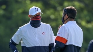 Head coach Matt Nagy of the Chicago Bears (L) meets with offensive coordinator Bill Lazor during training camp at Halas Hall on September 02, 2020 in Lake Forest, Illinois.