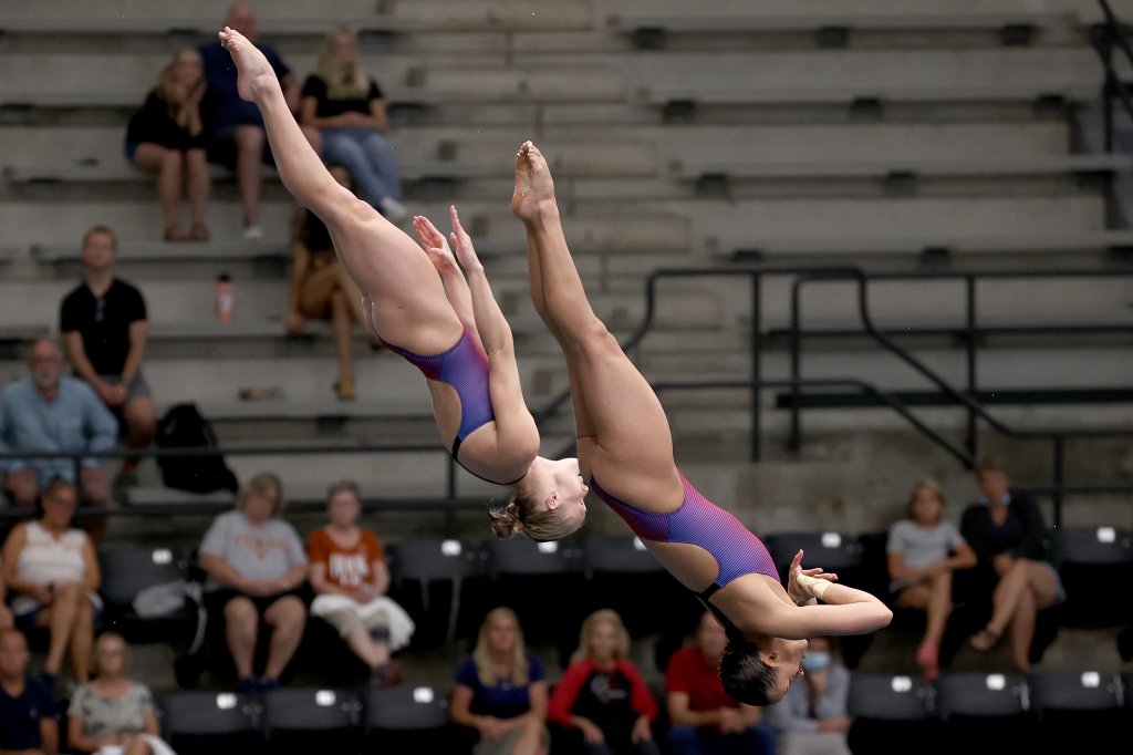 Delaney Schnell (L) and Jessica Parratto compete in the women's synchronized platform event during 2021 U.S. Olympic Trials, Diving, Day 6 at Indiana University Natatorium on June 11, 2021, in Indianapolis, Indiana.