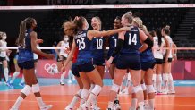 Team United States celebrates after defeating Team Argentina during the Women's Preliminary - Pool B on day two of the Tokyo 2020 Olympic Games at Ariake Arena on July 25, 2021 in Tokyo, Japan.