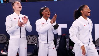 TOKYO, JAPAN – JULY 27: Grace McCallum, Simone Biles, and Jordan Chiles of Team United States cheer during the Women’s Team Final on day four of the Tokyo 2020 Olympic Games at Ariake Gymnastics Centre on July 27, 2021 in Tokyo, Japan. (Photo by Laurence Griffiths/Getty Images)