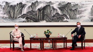 In this photo provided by the U.S. Department of State, U.S. Deputy Secretary of State Wendy Sherman, left, and Chinese Foreign Minister Wang Yi sit together in Tianjin, China, July 26, 2021.