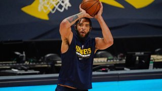 Apr 28, 2021; Denver, Colorado, USA; Denver Nuggets center JaVale McGee (34) warms up before the game against the New Orleans Pelicans at Ball Arena.