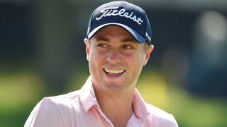 Aug 8, 2018; St. Louis, MO, USA; Justin Thomas smiles on the driving range during the Wednesday practice round of the PGA Championship golf tournament at Bellerive Country Club.