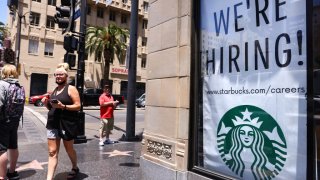 starbucks we're hiring sign