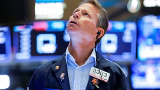 A trader works at the New York Stock Exchange (NYSE), August 19, 2021.