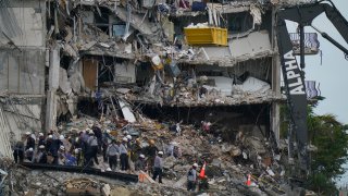 Search and rescue on top of the collapsed Champlain Towers South condo building