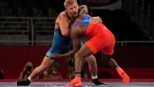 United State's Kyle Douglas Dake, left, competes against Cuba's Jeandry Garzon Caballero