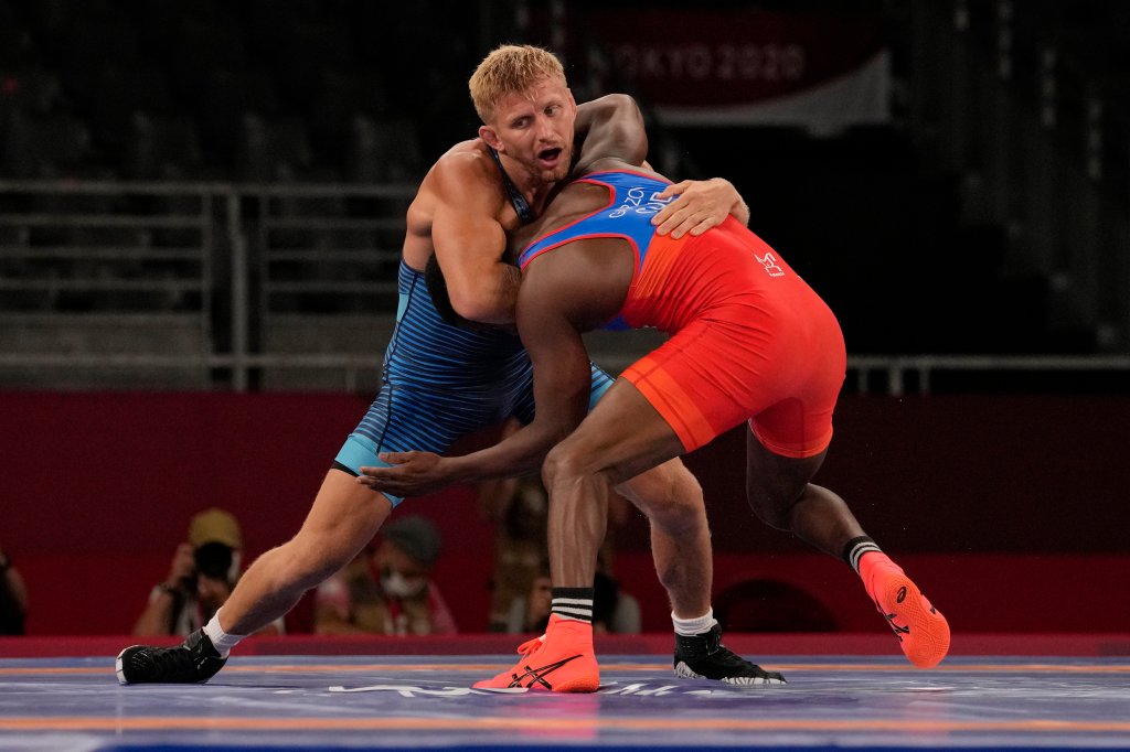 United State's Kyle Douglas Dake, left, competes against Cuba's Jeandry Garzon Caballero