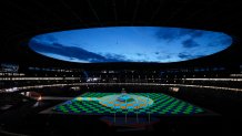 Lights illuminate the field in the Olympic Stadium prior to the start of the closing ceremony at the 2020 Summer Olympics, Sunday, Aug. 8, 2021, in Tokyo, Japan.