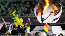 Australia's Sarah Carli, right, celebrates at the closing ceremony in the Olympic Stadium at the 2020 Summer Olympics, Sunday, Aug. 8, 2021, in Tokyo, Japan.