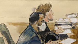 In this courtroom artist's sketch R. Kelly, left, listens during his trial in New York