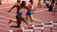 The United State's Dalilah Muhammad, Netherlands' Femke Bol and the United State's Sydney Mclaughlin compete in the women's 400m hurdles final during the Tokyo 2020 Olympic Games at the Olympic Stadium in Tokyo, Japan on Aug. 4, 2021.