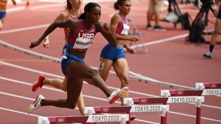 The United State's Dalilah Muhammad, Netherlands' Femke Bol and the United State's Sydney Mclaughlin compete in the women's 400m hurdles final during the Tokyo 2020 Olympic Games at the Olympic Stadium in Tokyo, Japan on Aug. 4, 2021.