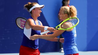 Barbora Krejcikova and Katerina Siniakova hug