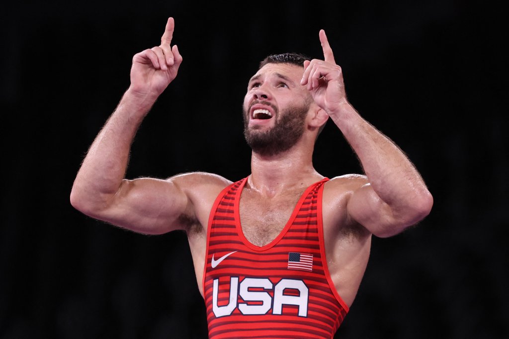 Team USA's Thomas Patrick Gilman celebrates his victory against Iran's Reza Atrinagharchi in their men's freestyle 57kg wrestling bronze medal match during the Tokyo 2020 Olympic Games at the Makuhari Messe in Tokyo on Aug. 5, 2021.