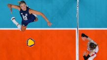 USA's Jordan Larson spikes the ball