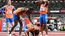 Netherlands' team react after taking second place in the men's 4x400m relay final during the Tokyo 2020 Olympic Games at the Olympic Stadium in Tokyo on Aug. 7, 2021.