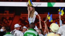 Ukraine's athletes gather on the field during the closing ceremony of the Tokyo 2020 Olympic Games, at the Olympic Stadium, in Tokyo, on Aug. 8, 2021.