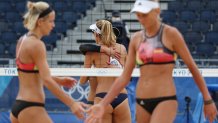 Alix Klineman #2 of Team United States celebrates with April Ross #1 against Team Germany during the Women's Quarterfinal beach volleyball on day eleven of the Tokyo 2020 Olympic Games at Shiokaze Park on August 03, 2021 in Tokyo, Japan.