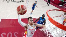 Victor Claver #10 of Team Spain goes up for a dunk against Team United States during the first half of a Men's Basketball Quarterfinal game on day eleven of the Tokyo 2020 Olympic Games at Saitama Super Arena on Aug. 3, 2021, in Saitama, Japan.