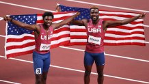Bronze medal winner Noah Lyles and silver medal winner Kenneth Bednarek, both of Team USA, celebrate after the Men's 200m final on day twelve of the Tokyo Olympic Games at Olympic Stadium on Aug. 4, 2021, in Tokyo, Japan.
