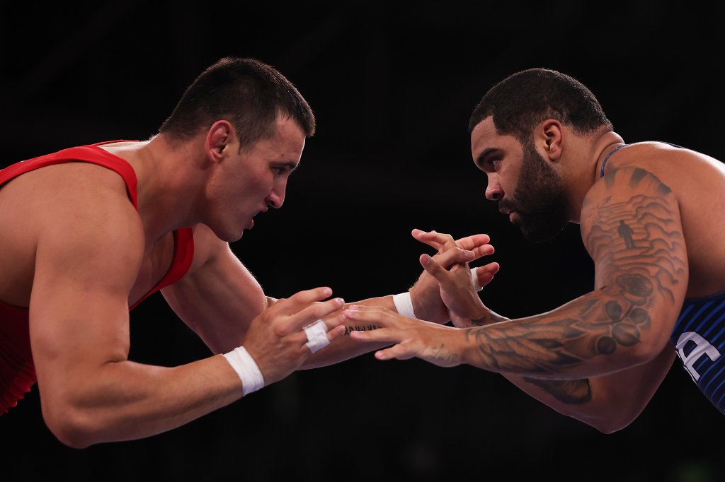 Aiaal Lazarev of Team Kyrgyzstan competes against Gable Dan Stevenson of Team United States