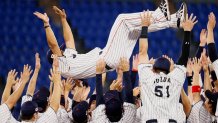 Team Japan celebrates during the gold medal game between Team USA and Team Japan on day fifteen of the Tokyo 2020 Olympic Games at Yokohama Baseball Stadium on Aug. 7, 2021 in Yokohama, Kanagawa, Japan.