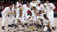 Team USA pose with their gold medals during the men's casketball medal ceremony on day fifteen of the Tokyo Olympic Games at Saitama Super Arena on Aug. 7, 2021 in Saitama, Japan.