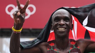 Kenya's Eliud Kipchoge celebrates after winning the men's marathon final during the Tokyo 2020 Olympic Games