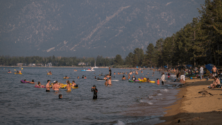 People visit Pope Beach in South Lake Tahoe.