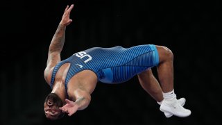 USA's Gable Steveson celebrates the gold medal after the men's freestyle 125kg wrestling competition 