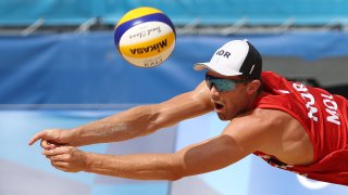 Anders Mol of Team Norway dives for the ball against Team ROC during the Men's Quarterfinal beach volleyball on day twelve of the Tokyo 2020 Olympic Games