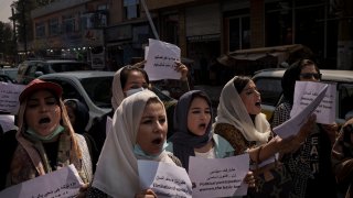 Women march to demand their rights under the Taliban rule during a demonstration near the former Women’s Affairs Ministry building in Kabul, Afghanistan, Sunday, Sept. 19, 2021.