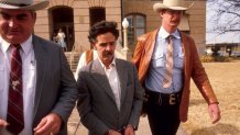 Serial killer Henry Lee Lucas is led from the Williamson County jail after being arrested by Texas Rangers in 1979. Lucas died of natural causes on 13 March 2001 in his Texas prison home. --- Photo by Bob Daemmrich/Corbis Sygma (Photo by Robert Daemmrich Photography Inc/Sygma via Getty Images)