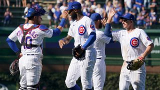 CHICAGO, ILLINOIS – SEPTEMBER 06: The Chicago Cubs celebrate their team win over the Cincinnati Reds at Wrigley Field on September 06, 2021 in Chicago, Illinois. The Cubs defeated the Reds 4-3. (Photo by Nuccio DiNuzzo/Getty Images)