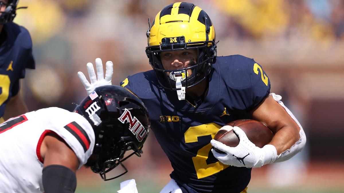 Corum s 3 TDs Help No. 25 Michigan Rout N. Illinois 63 10 NBC