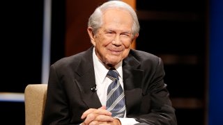FILE - In this Friday, Oct. 23, 2015 file photo, Rev. Pat Robertson poses a question to a Republican presidential candidate during a forum at Regent University in Virginia Beach, Va. The Christian Broadcasting Network, which Robertson founded, says he was rushed to the nearest stroke center Friday, Feb. 2, 2018 after a family member recognized the onset of stroke symptoms, and the 87-year-old Robertson is alert and expected to make a full recovery.