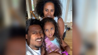 This undated family photo provided by The Dan Caplis Law Firm, LLC shows a photo of Wongel Estifanos, center, and her parents, Estifanos Dagne and Rahel Estifanos.
