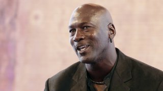 Former professional US basketball player Michael Jordan at a press conference at the Palais de Tokyo in Paris.