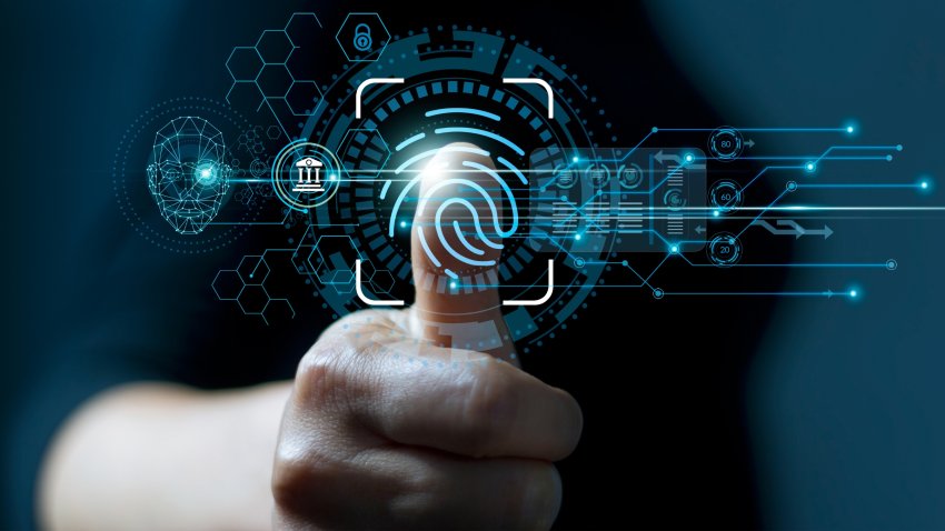 Businessman using fingerprint indentification to access personal financial data. Idea for E-kyc (electronic know your customer), biometrics security, innovation technology against digital cyber crime