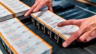 This October 2021 photo provided by Pfizer shows boxes of kid-size doses of its COVID-19 vaccine. The U.S. moved a step closer to expanding vaccinations for millions more children as a panel of government advisers on Tuesday, Oct. 26, endorsed kid-size doses of Pfizer's shots for 5- to 11-year-olds.