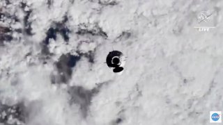 In this image from video made available by NASA, astronauts in the SpaceX Dragon capsule approach the International Space Station on Thursday, Nov. 11, 2021.