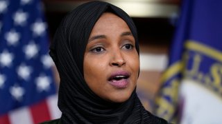 Rep. Ilhan Omar, D-Minn., speaks to reporters in the wake of anti-Islamic comments made last week by Rep. Lauren Boebert, R-Colo., who likened Omar to a bomb-carrying terrorist, during a news conference at the Capitol in Washington, Tuesday, Nov. 30, 2021.