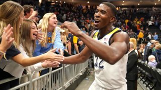 MILWAUKEE, WISCONSIN – NOVEMBER 15: Darryl Morsell #32 of the Marquette Golden Eagles celebrates a win after a college basketball game against the Illinois Fighting Illini at the Fiserv Forum on November 15, 2021 in Milwaukee, Wisconsin. (Photo by Mitchell Layton/Getty Images)