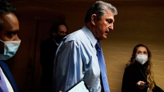 U.S. Senator Joe Manchin (D-WV) returns to a basement office meeting with other senators that included Kyrsten Sinema (D-AZ), Jon Tester (D-MT), Tim Kaine (D-VA) and Angus King (I-ME), (not pictured) at the U.S. Capitol in Washington, December 15, 2021.