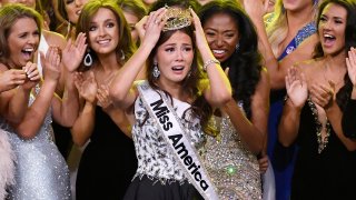 Miss Alaska Emma Broyles, center, reacts after being crowned Miss America
