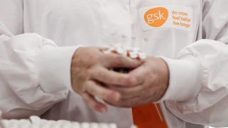 A GSK employee is at work at the factory of British pharmaceutical company GlaxoSmithKline