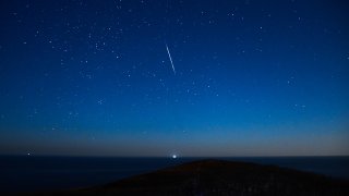 A view of the sky over Cape Vyatlina on Russky Island during the peak of the Geminids meteor shower in December, 2021. Getty Images