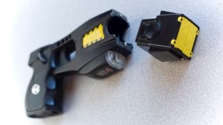 Black Taser with part unattached